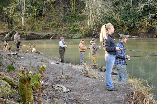 From left, John Cline, Doug Drake, Marc Cline, Dale Massey, Bethany Hoover and Travis Bruhn attempt to entice a winter run steelhead to take their bait. Massey was the only one of the six who had yet to be successful with an eight to 10-pound steelie with one-punch in its gill plate. Punched gill plates indicate the fish was returning a second time to spawn.