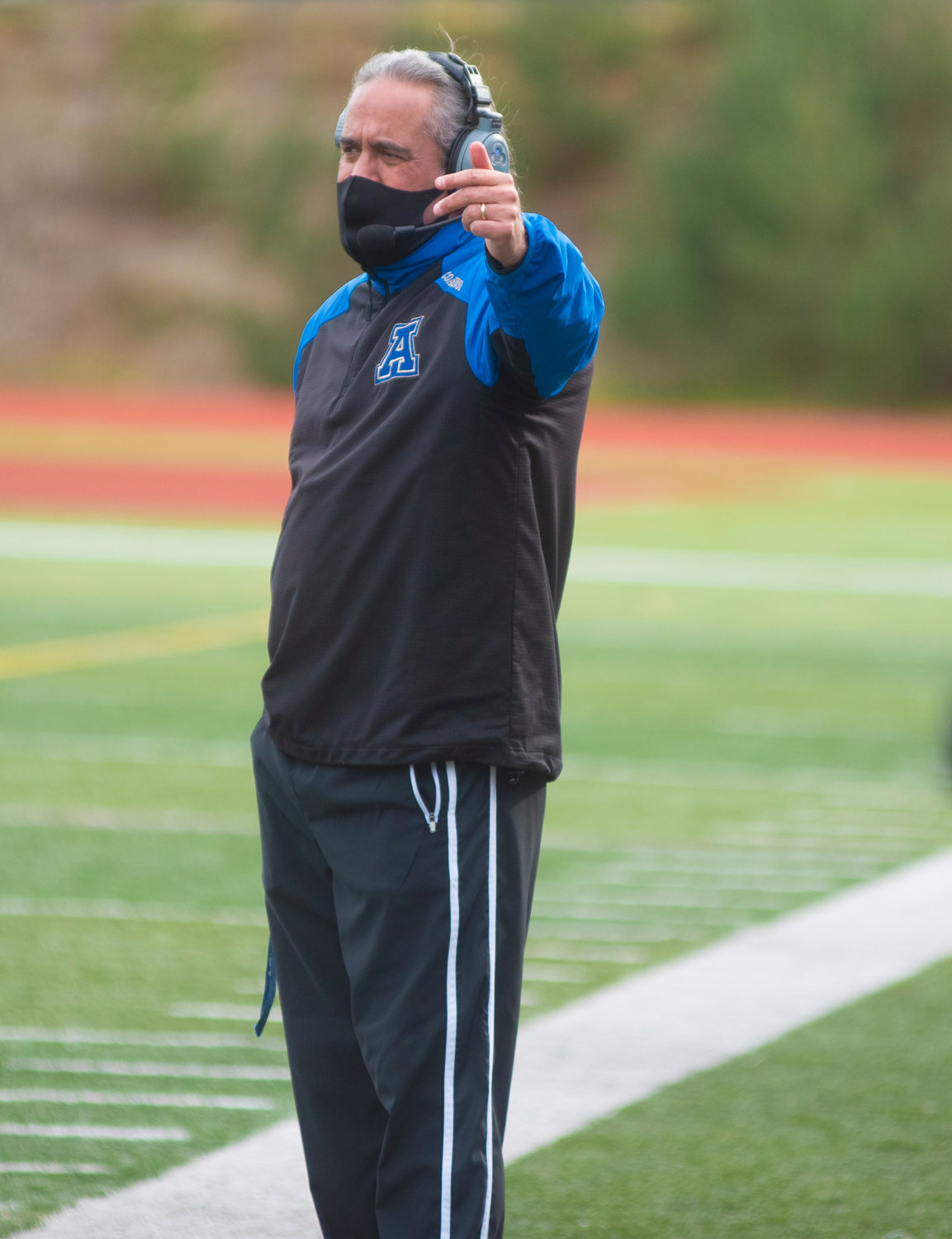 Adna coach K.C. Johnson instructs his team during the Pirates' game against Kalama on Saturday.