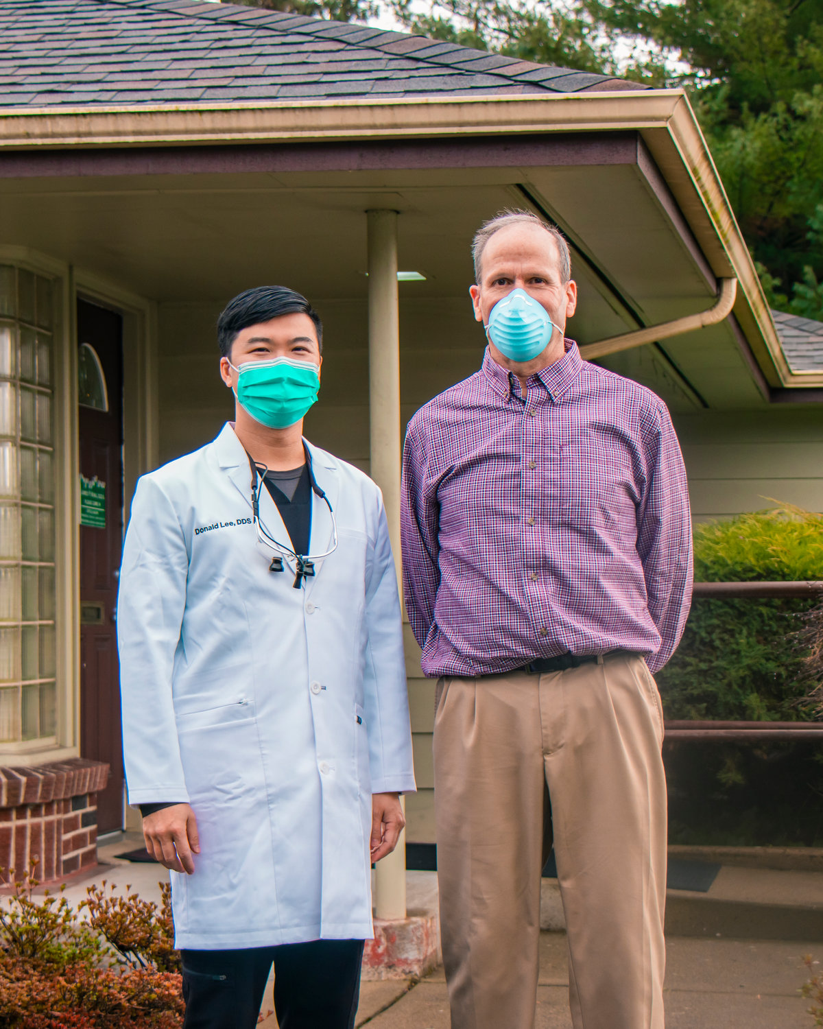 Donald Lee, DDS, left, and James King, DDS, pose for a photo outside the dentistry office located at 228 Harrison Ave. in Centralia.