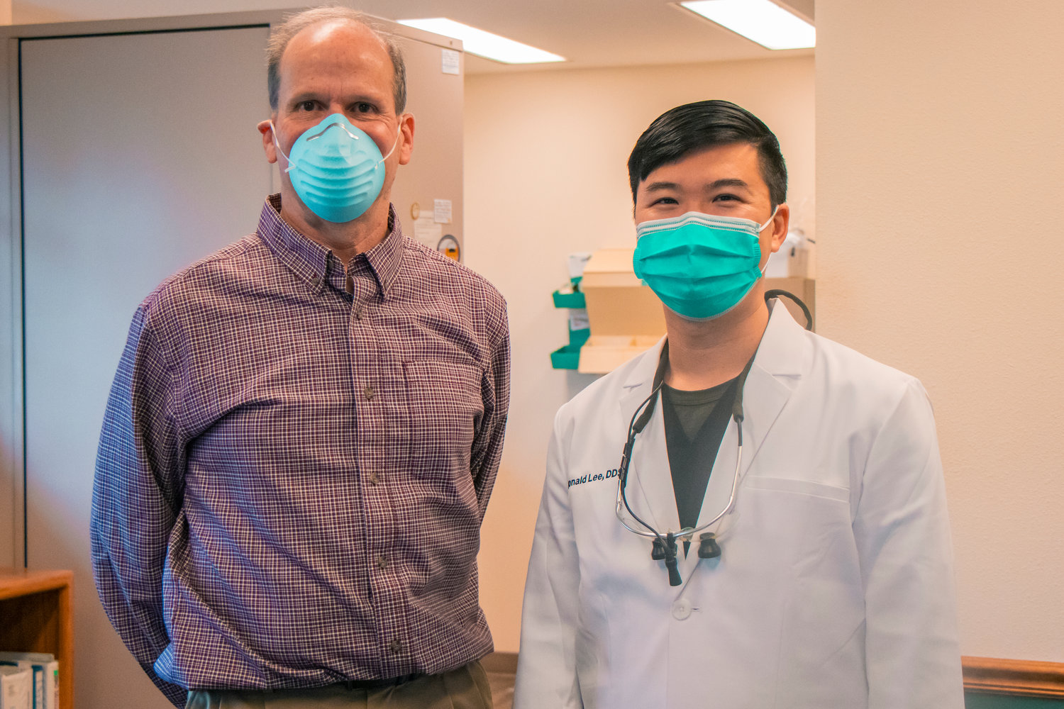 Donald Lee, DDS, left, and James King, DDS, pose for a photo inside the dentistry office located at 228 Harrison Ave. in Centralia.