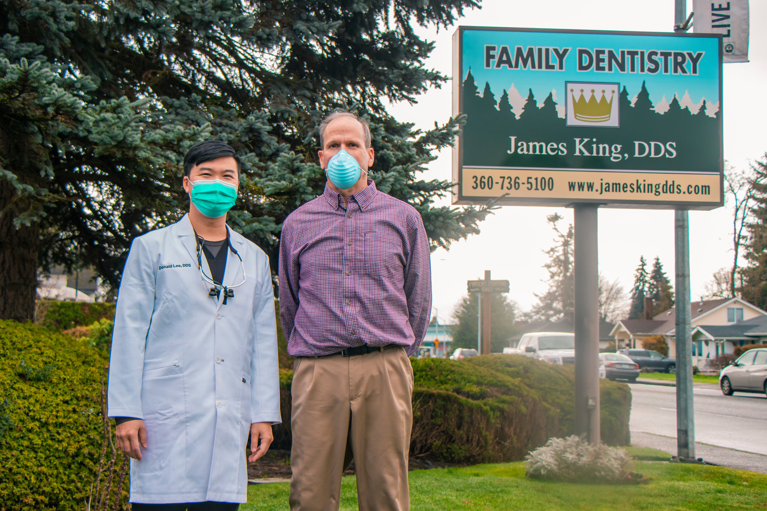 Donald Lee, DDS, left, and James King, DDS, pose for a photo outside the dentistry office in Centralia on Thursday.