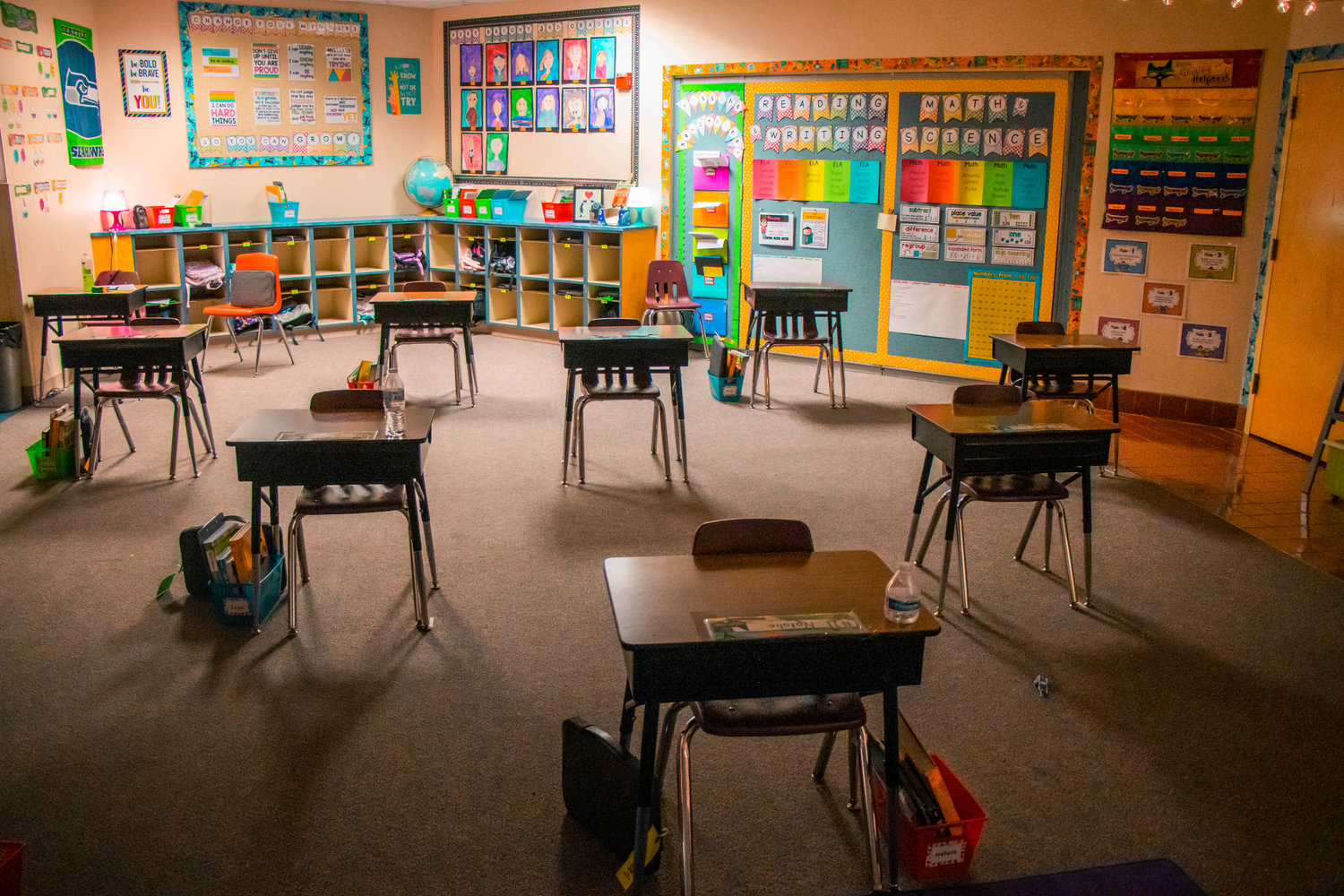 FILE PHOTO — Desks are separated by six feet to help prevent the spread of COVID-19 at Winlock Miller Elementary School in this photo taken earlier this year.
