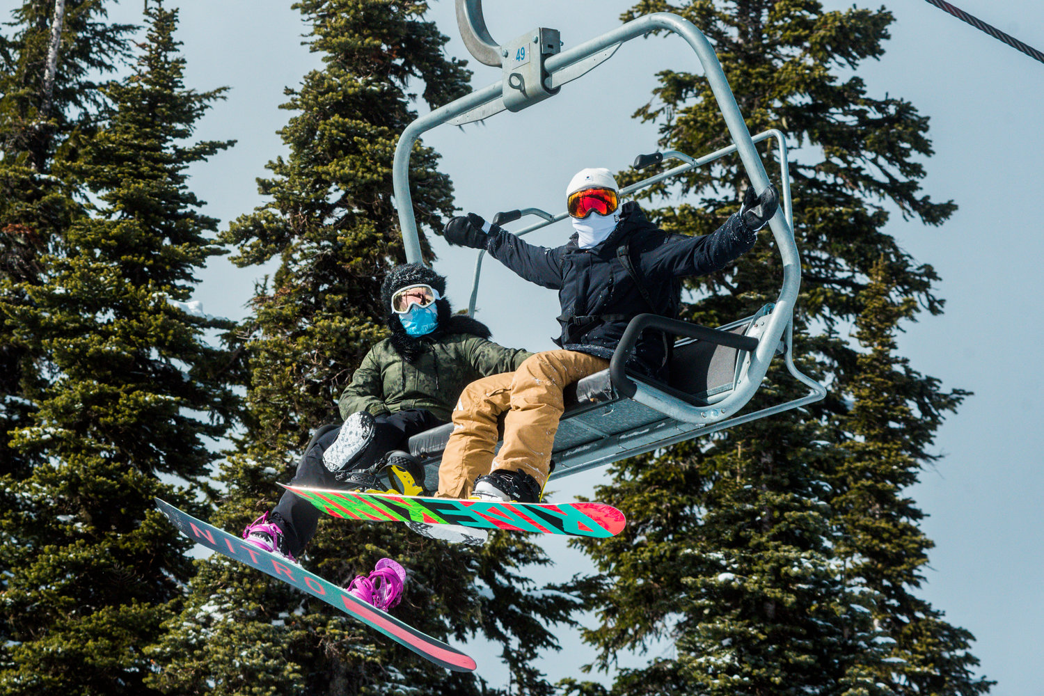 Snowboarders celebrate a birthday by visiting the White Pass Ski Area on Sunday.