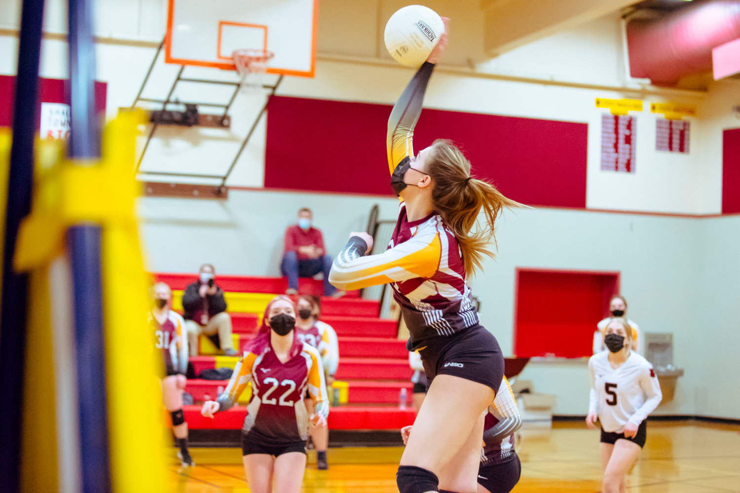 Winlock's Karlie Jones (23) hits the ball during a game against Toledo played Monday night in Winlock.