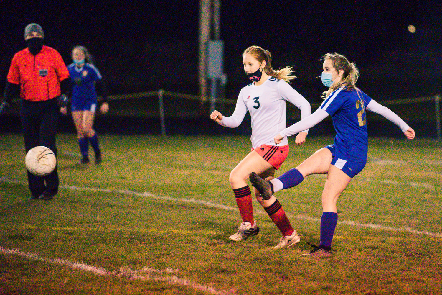Onalaska's Callie Lawrence (21) kicks the ball down field during a game against Toledo Monday night.