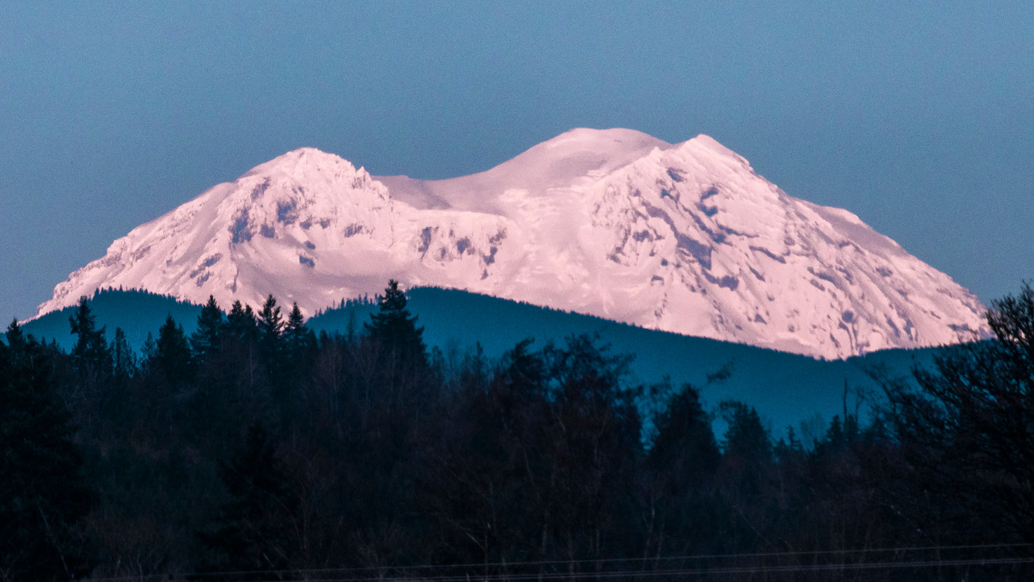 A snow-covered Mount Rainier offered a stunning view from Onalaska on Tuesday afternoon.
