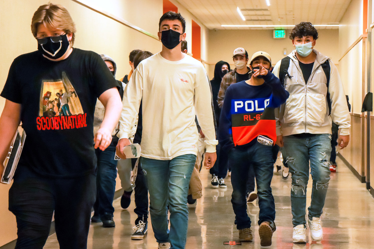 Students sport masks as they walk to their classes during their first week back in school at Centralia High School.