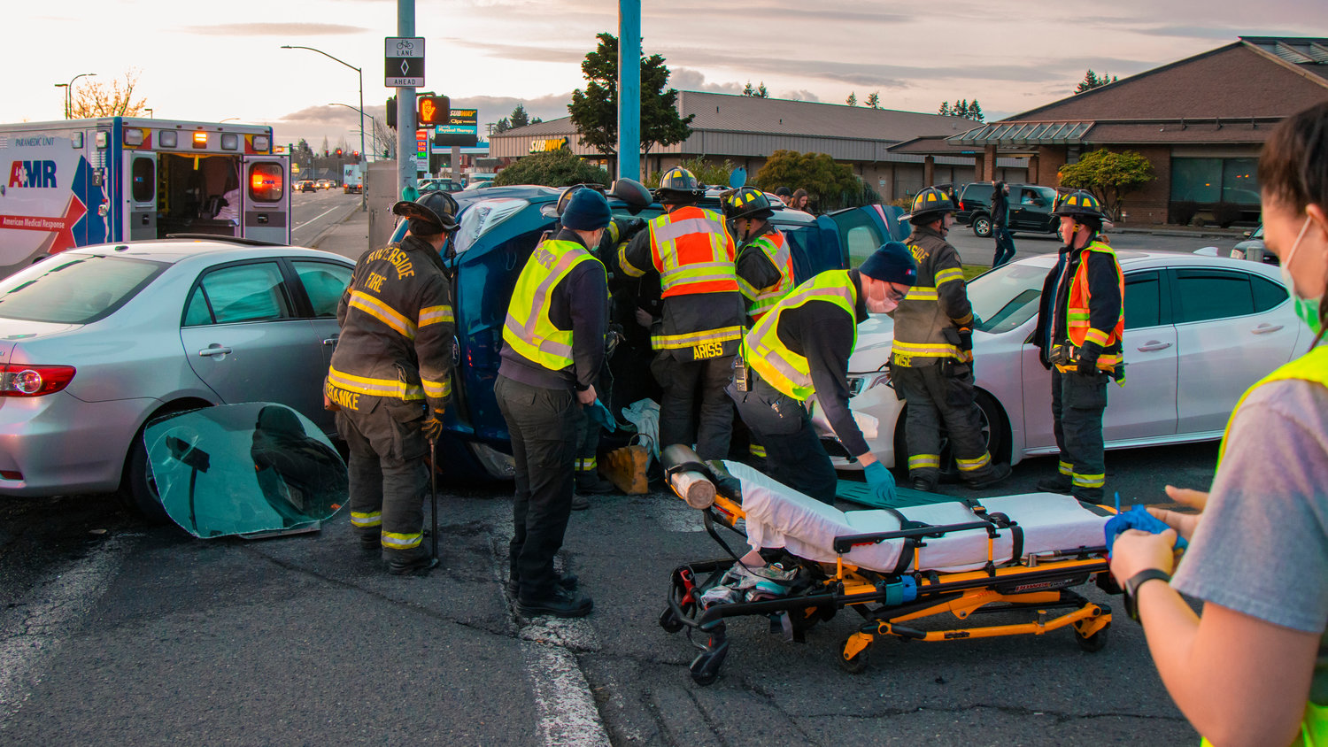 Emergency crews respond to the scene of a multi-vehicle collison in Centralia at the intersection of Harrison and Belmont Avenue on Tuesday.