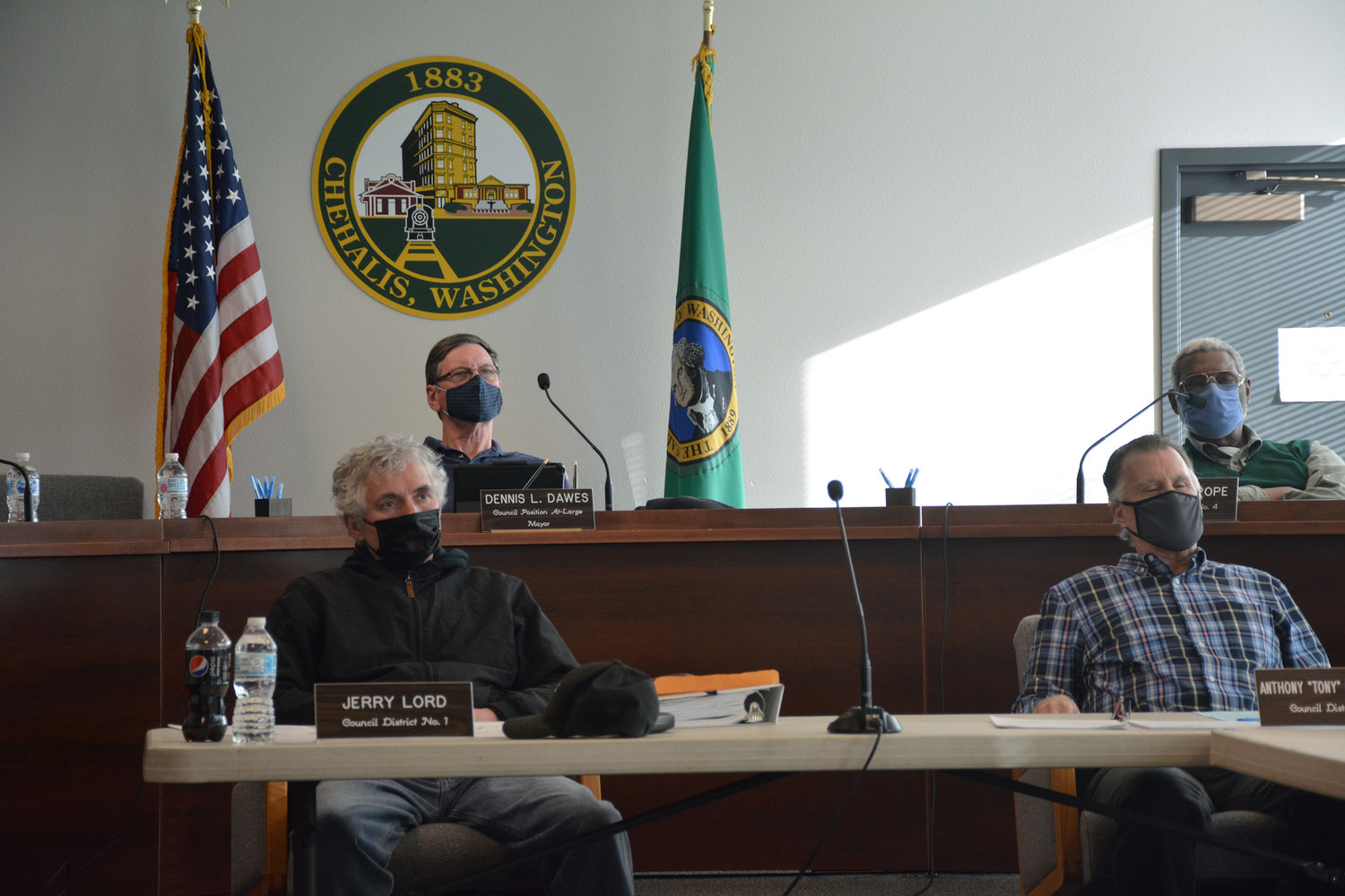 Chehalis city councilmembers listen to a member of the public’s critiques at a Monday meeting this week.