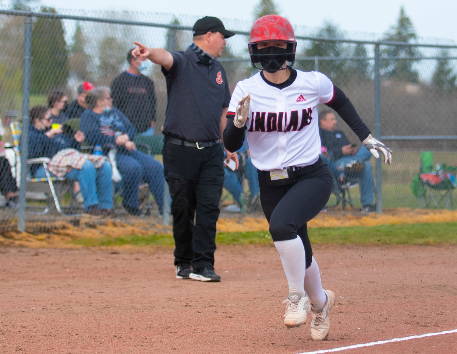 Toledo's Brynn Williams sprints home to score a run for the Indians in the first inning against Wahkiakum on Thursday.