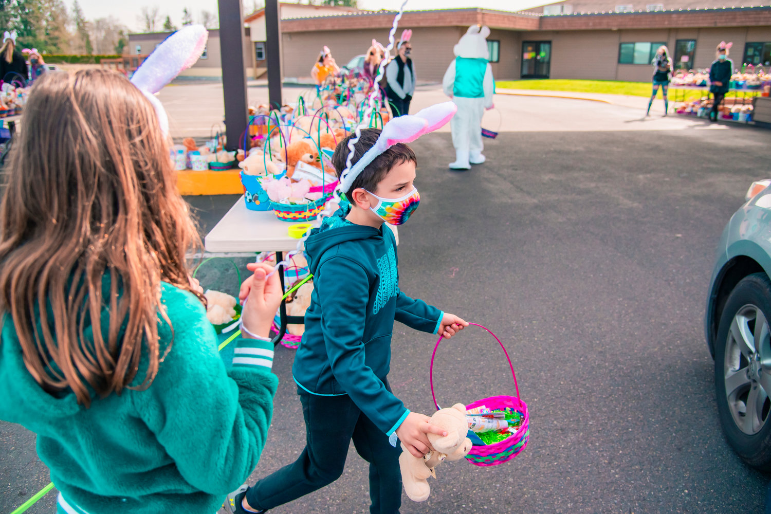 Antonio and Sophia Abbarno help hand out Easter baskets at Bethel Church in Chehalis on Saturday.