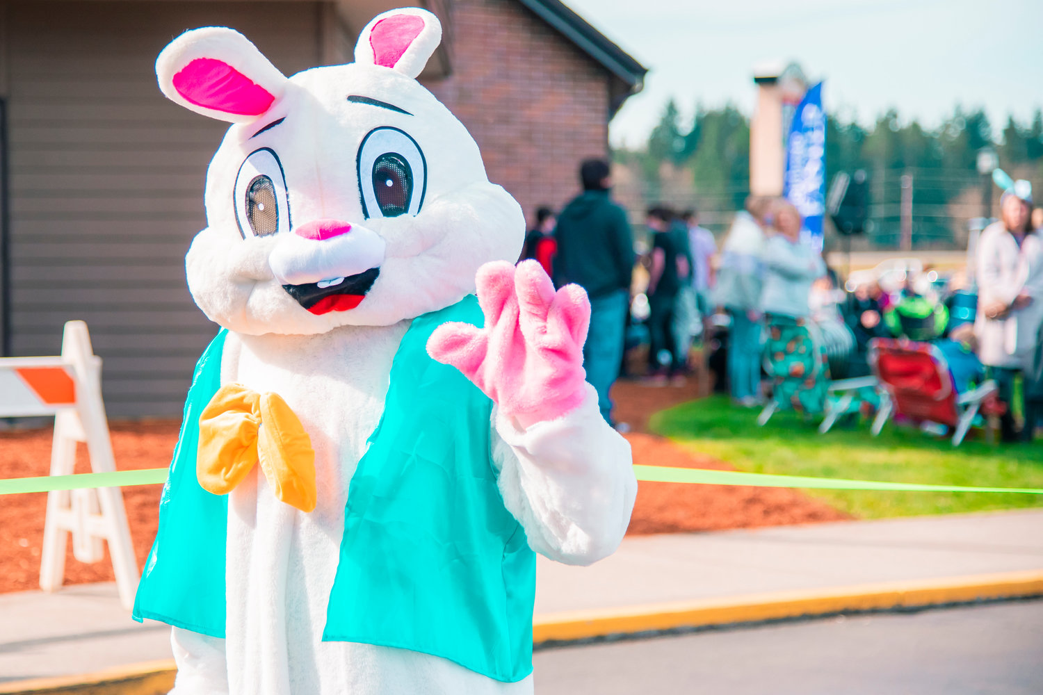 The Easter Bunny waves to visitors at Bethel Church during an event on Saturday in Chehalis.