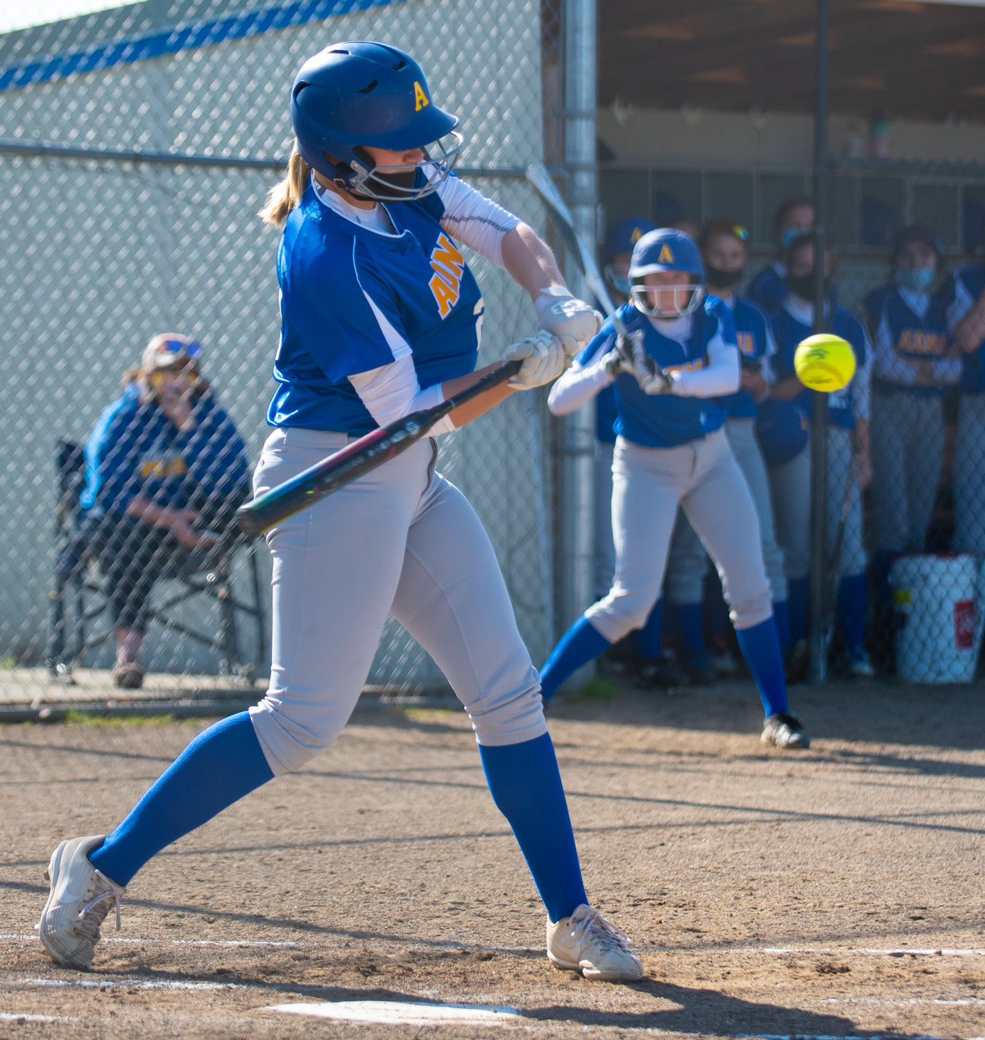 Adna's Karlee Von Moos loads up to swing at a Toledo pitch on Monday.