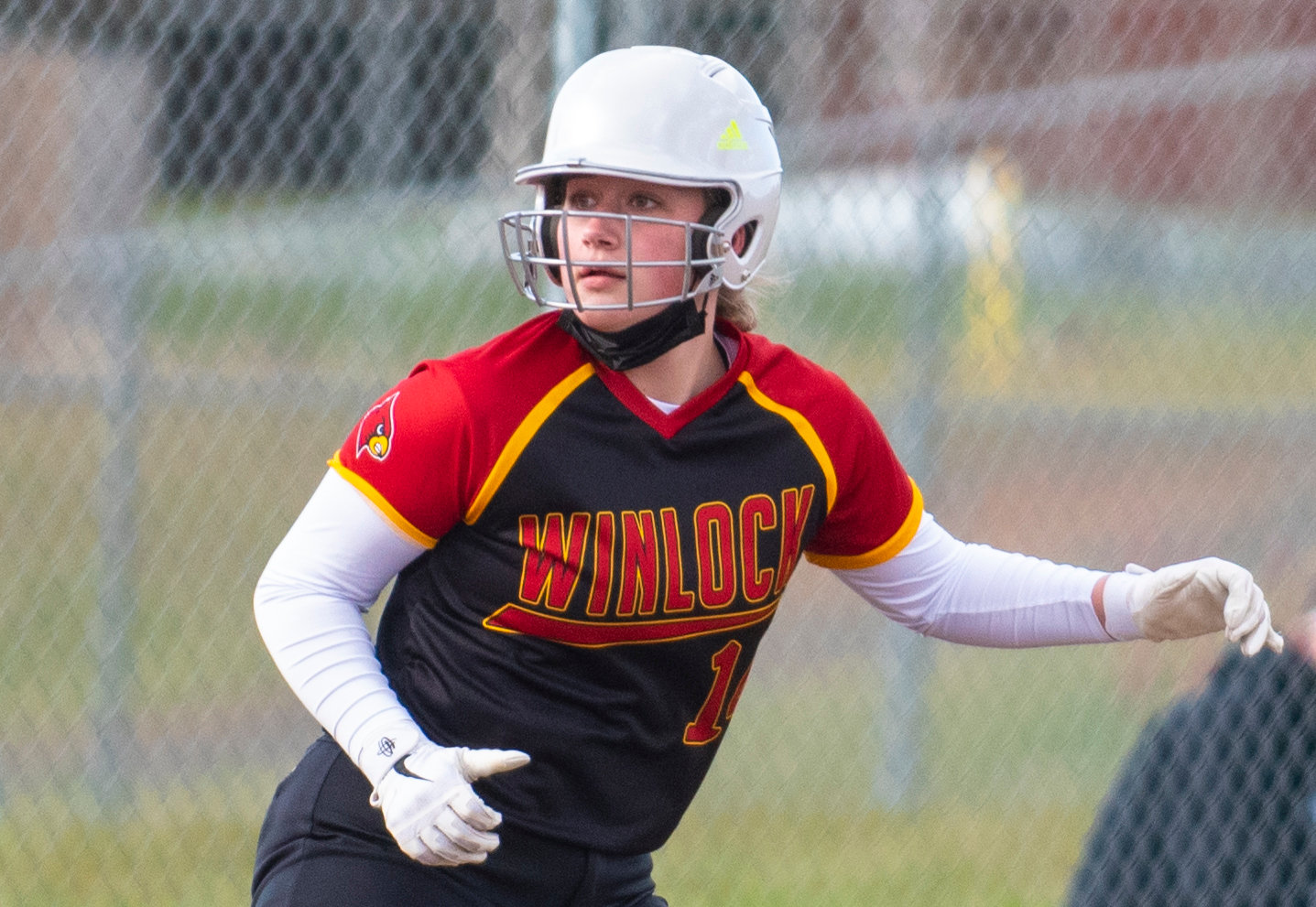 Winlock junior Addison Hall watches a play at the plate from the third base line on Thursday.
