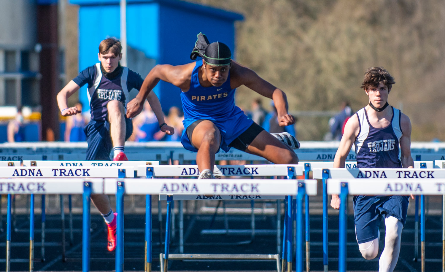 FILE PHOTO - Adna's Willis Ames, center, captured the boys 110-meter high hurdles on Tuesday in Adna.