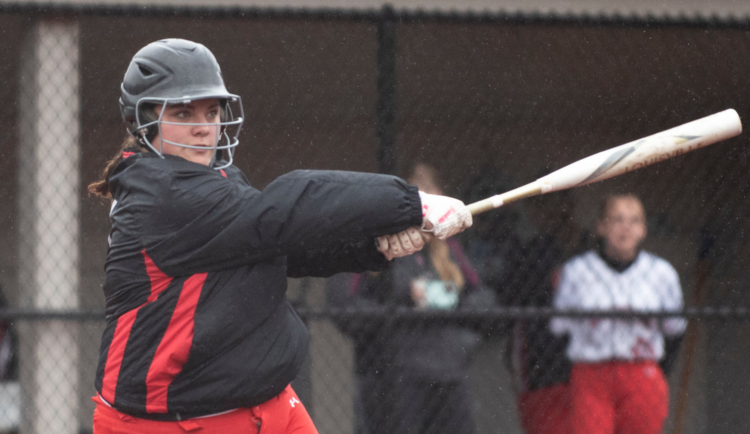 Mossyrock’s Bailey Tofaeono smacks a base hit against Naselle on Saturday in Montesano.