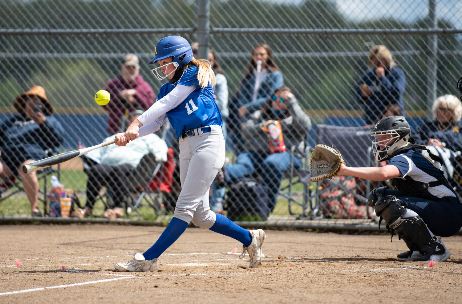 Adna leadoff hitter Danika Hallom connects on a Forks pitch on Saturday.