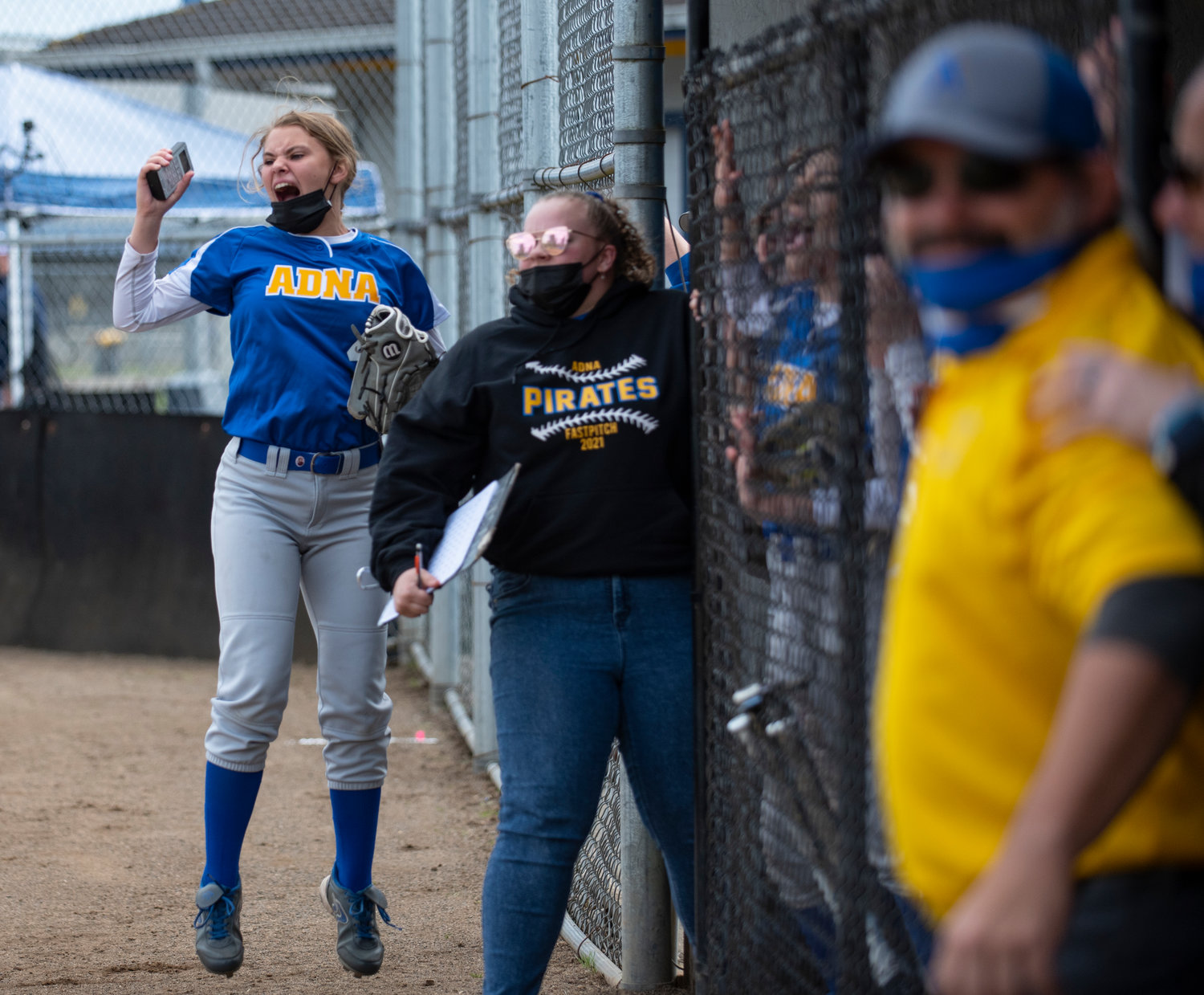 Adna's Gracie Beaulieu, left, jumps in celebration after Karle Von Moos' RBI triple breaks a 0-0 tie in the fourth inning.