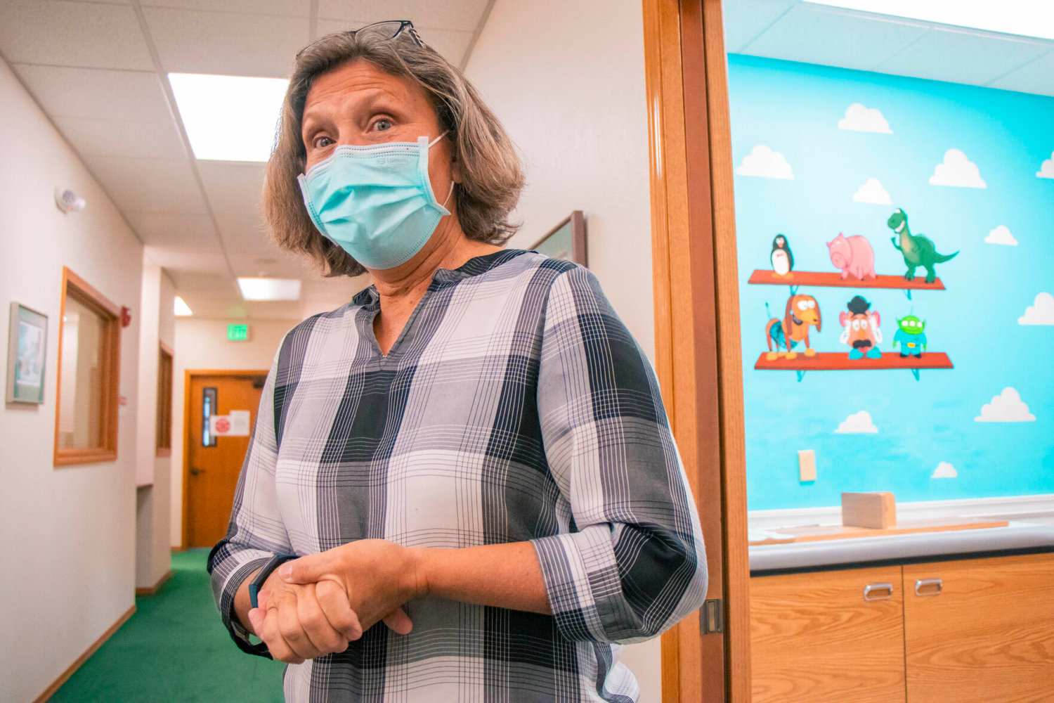 Dr. Jennifer Polley, medical director at Northwest Pediatric Center, talks about the art inside examination rooms in this December 2020 Chronicle file photo