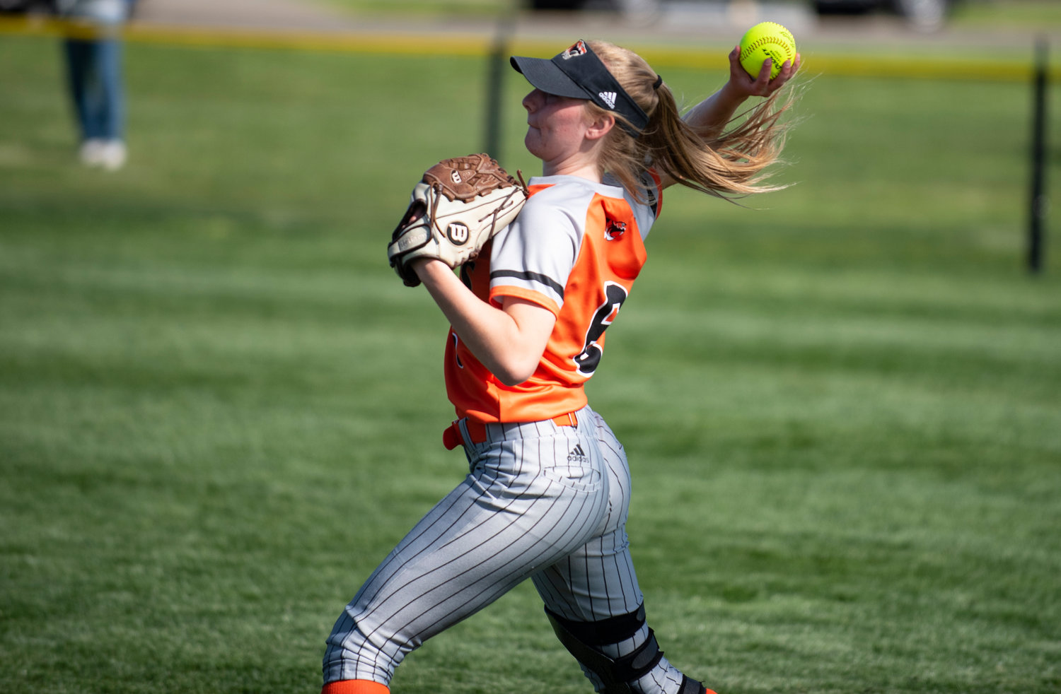 Centralia's Hannah Robbins makes a throw from right field on Tuesday.