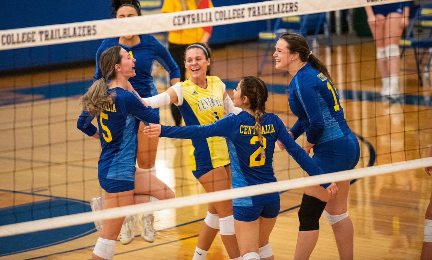 Centralia College volleyball players celebrate a point against Highline at home on Wednesday.