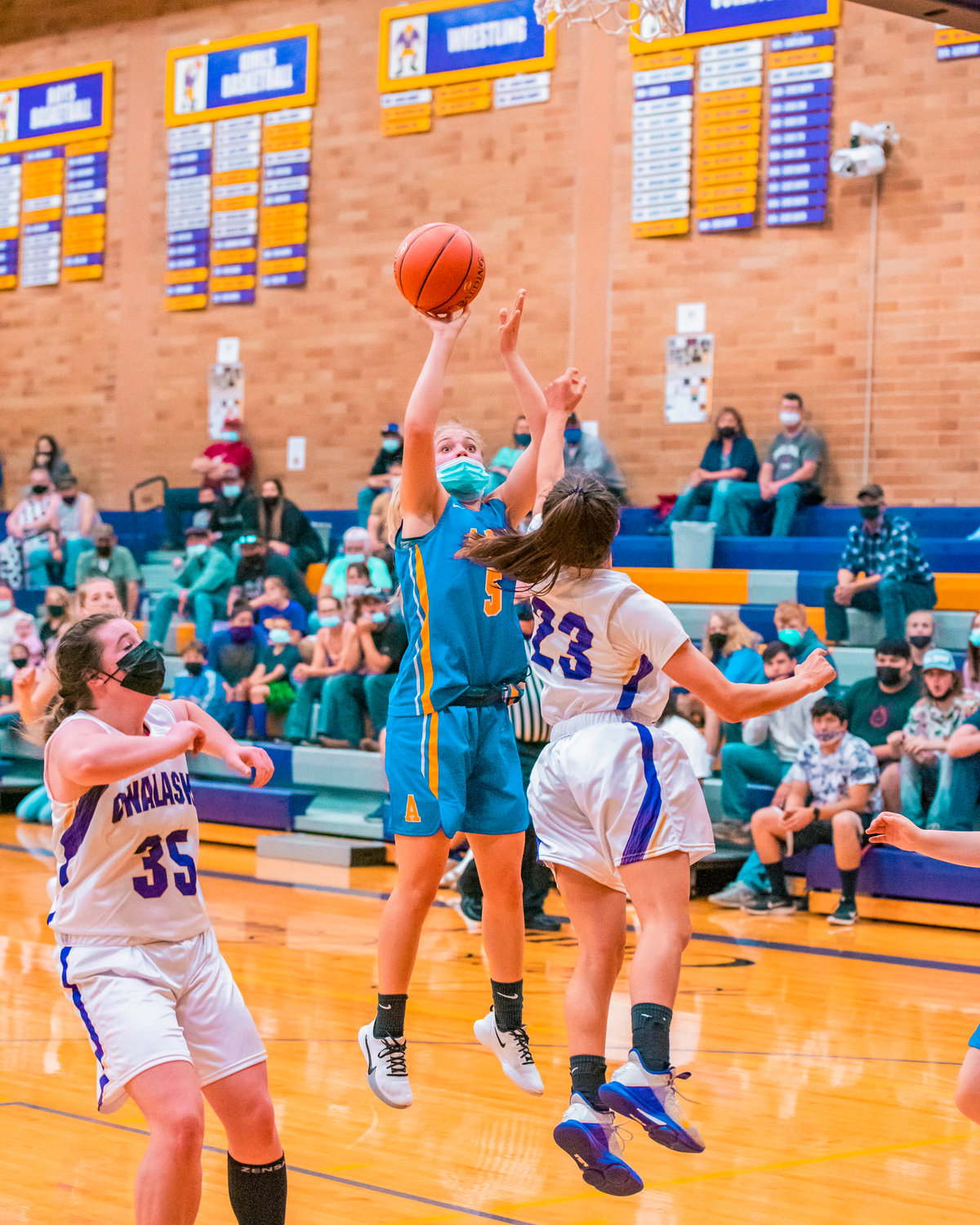 Adna’s Kaylin Todd (5) goes up for a shot during a game against Onalaska on Thursday.