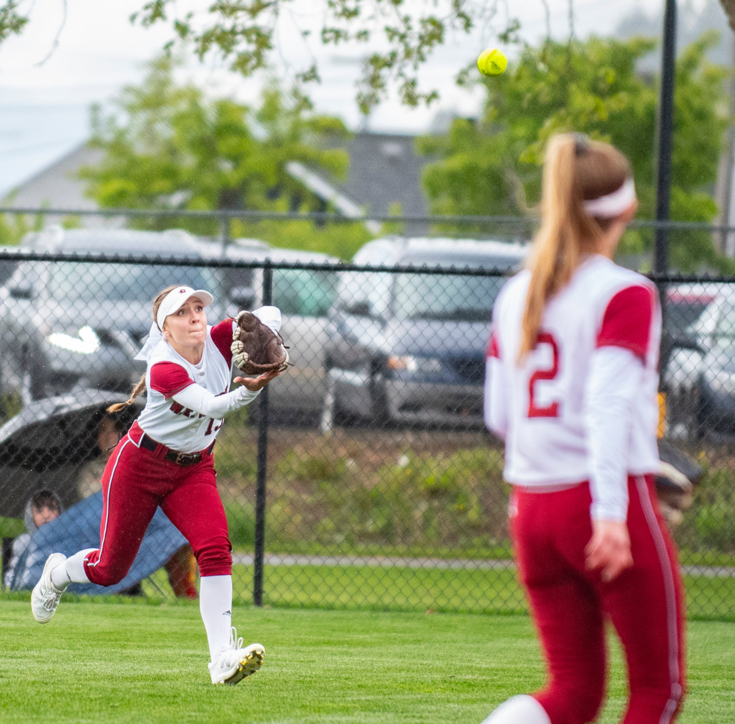 W.F. West senior Alisha Anderson makes a running catch in center field on Thursday.