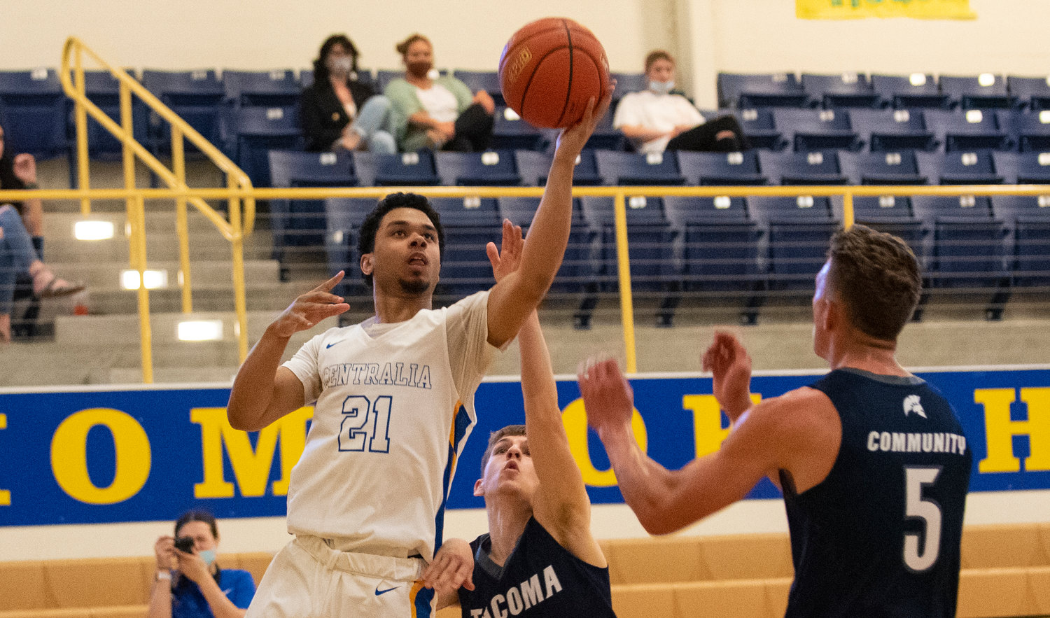 Centralia College's Wendell Davis Jr. (21) rises for a layup against Tacoma.
