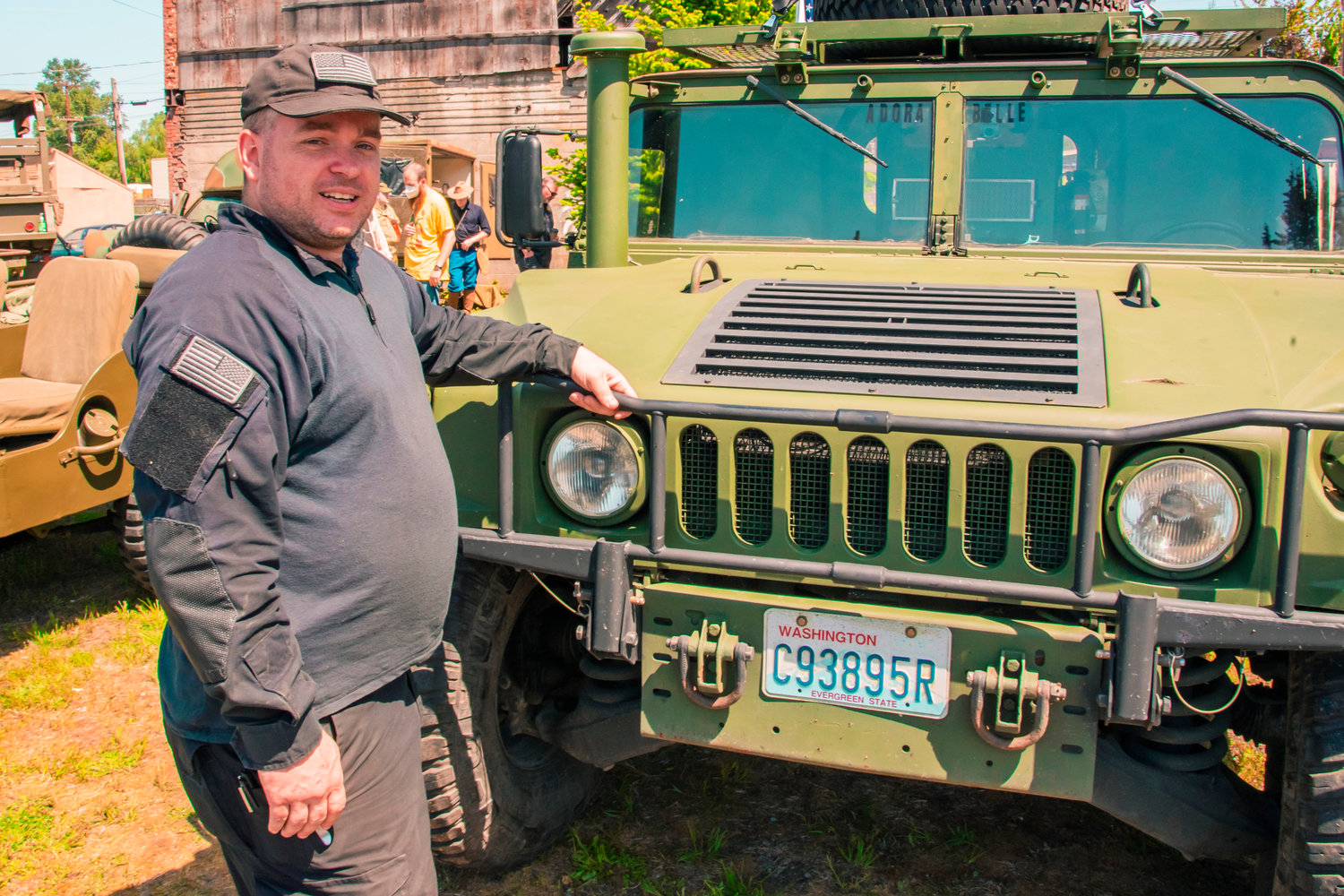 Christopher Watts talks about his M1123 HMMWV he displayed in downtown Centralia during Armed Forces Day.