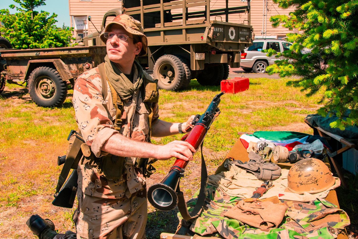 Ryan Buda holds up an RPG7 while showcasing his collection of military items during Armed Forces Day. Armed Forces Day was marked Saturday at America’s Team Museum at 622 N. Tower Ave., Centralia. Museum owner Peter Lahmann wrote on Facebook that there was a “great turnout.”  “Had about 12 vehicles and 15 living historians, sharing with the public on military history topics,” Lahmann wrote. “It was a nice day and we got to meet a lot of nice people.  There was emphasis for this event on the 30th Anniversary of Desert Storm. Thanks for all that were able to help out with this event.”