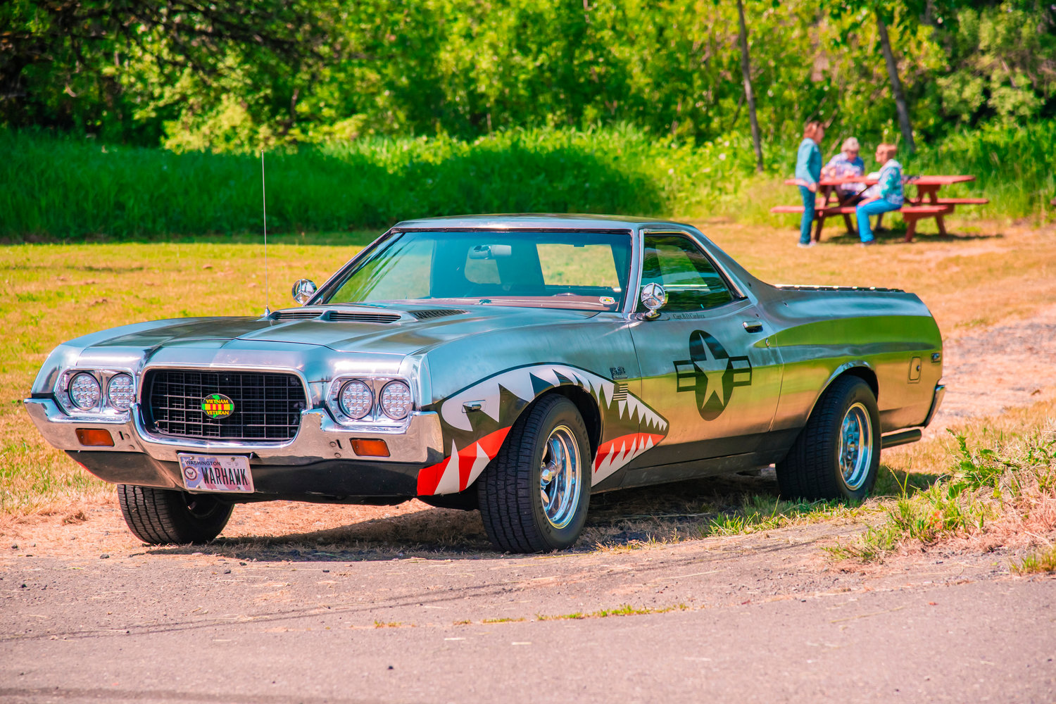 A vehicle with the license plate “Warhawk” sits on display during a “Back The Blue” event in Adna on Saturday.