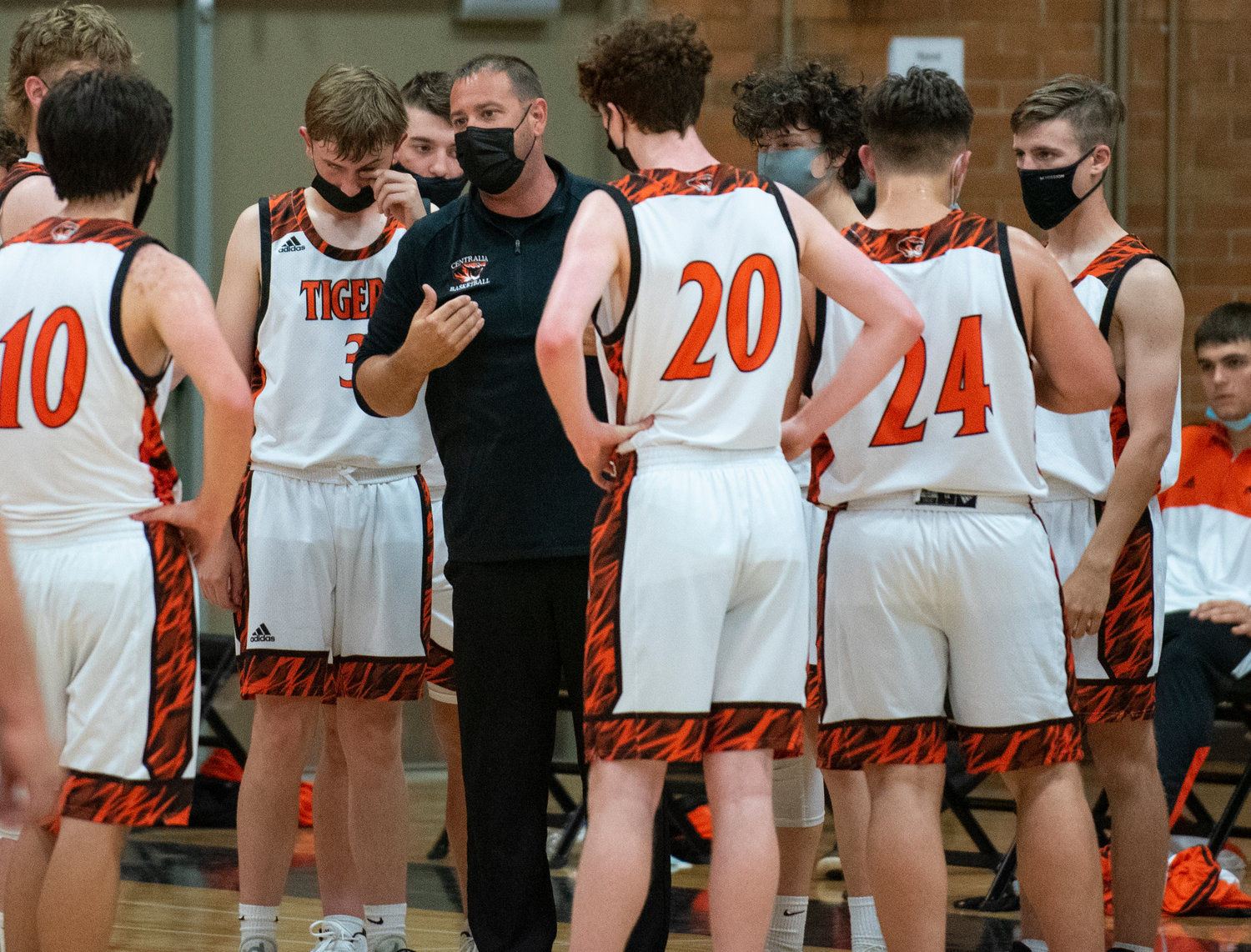 Centralia coach Kyle Donahue instructs his team during the a timeout in the third quarter on Monday.