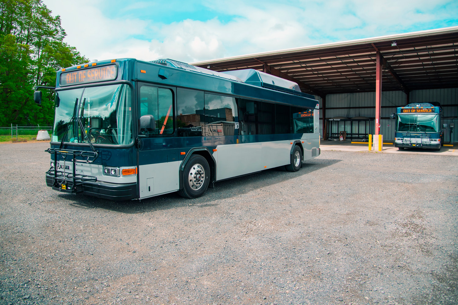 Two of the new Twin Transit electric buses are seen in Centralia on Wednesday after being remodeled and having their diesel engines swapped for rechargeable batteries.