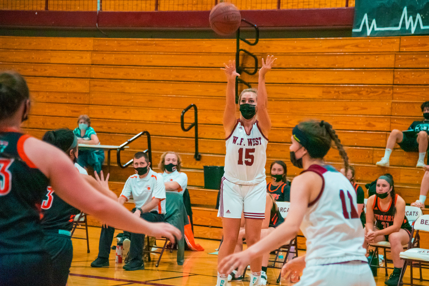 FILE PHOTO - W.F. West’s Madi Mencke (15) makes a deep shot during a game against the Tigers played Monday night in Chehalis.
