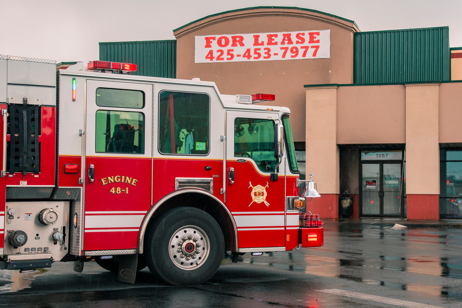 Chehalis Fire responds to the Twin City Town Center shopping plaza after alarms in multiple stores rang for a fire that started in a trash bin and triggered outside sprinkler systems on Wednesday.