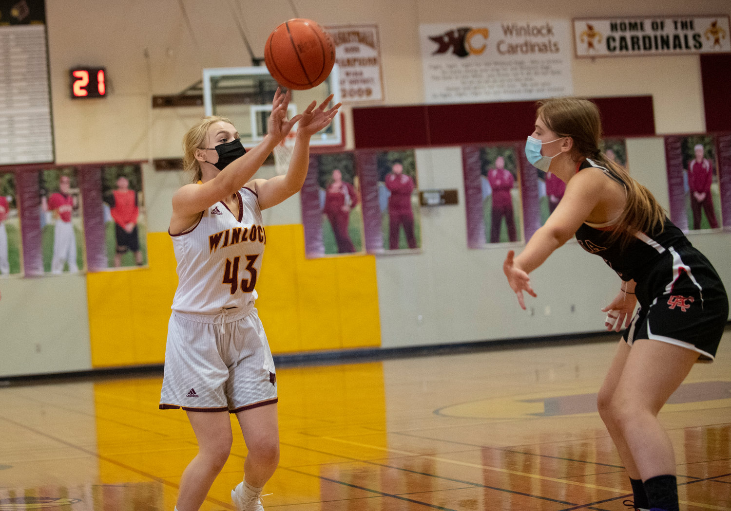 Winlock junior Maia Chaney (43) throws a pass into the paint against Kalama.