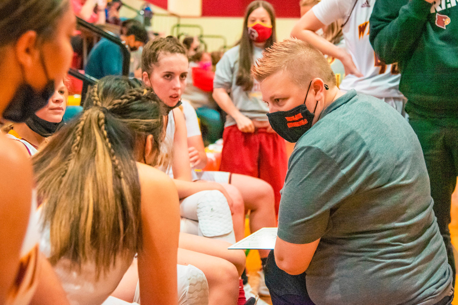 Winlock’s Head Coach Tori Nelson talks to players during a game on Thursday.
