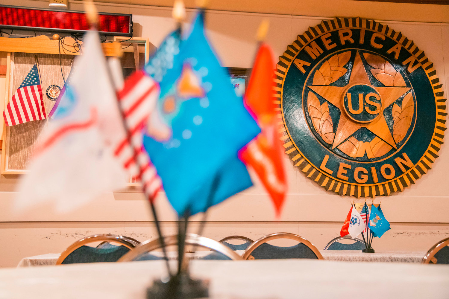 Flags decorate a social room inside the Centralia American Legion on Thursday.