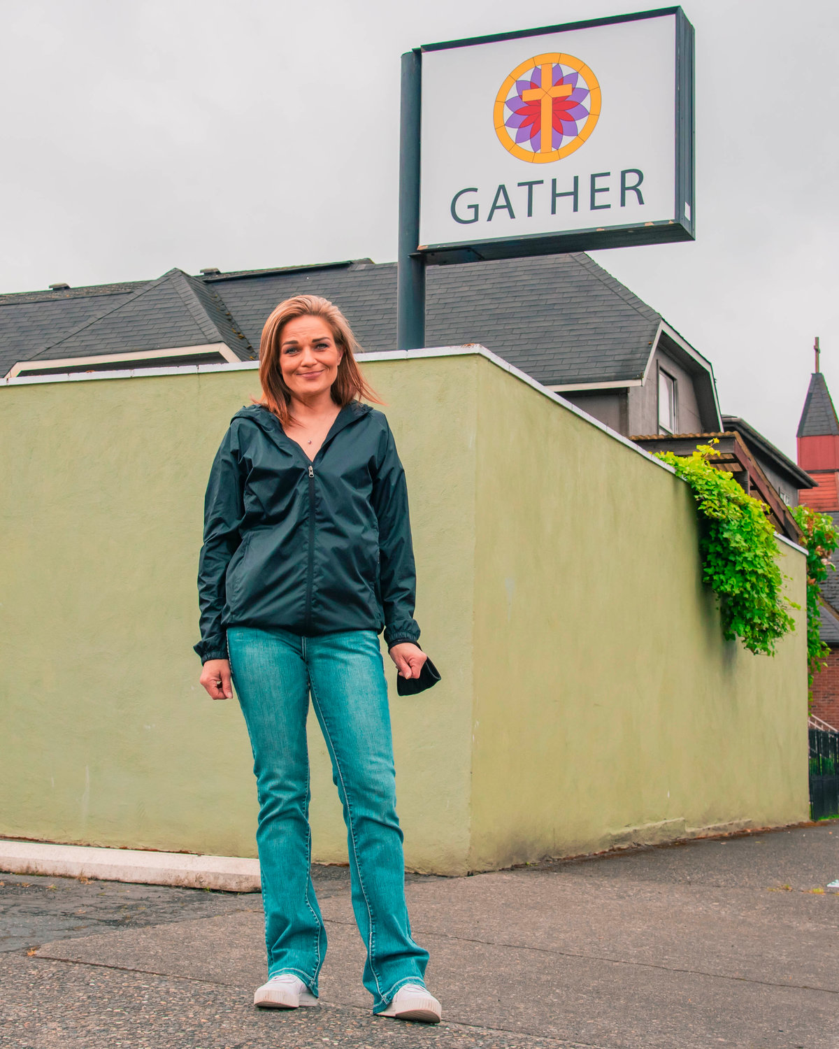 Brooke Reder smiles and poses for a photo outside the Gather Cafe in Centralia on Monday.