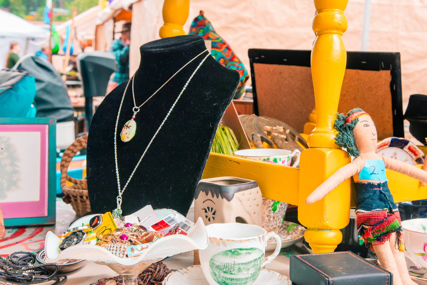 Antiques and jewlery sit on display at the Packwood Flea Market Friday morning.