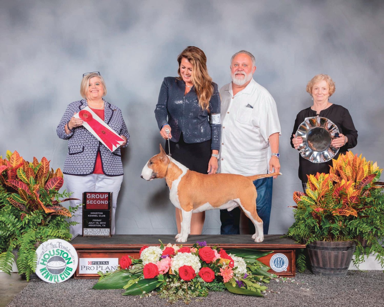 Patty Keenan, left, judges at a Houston Kennel Club event in 2019.