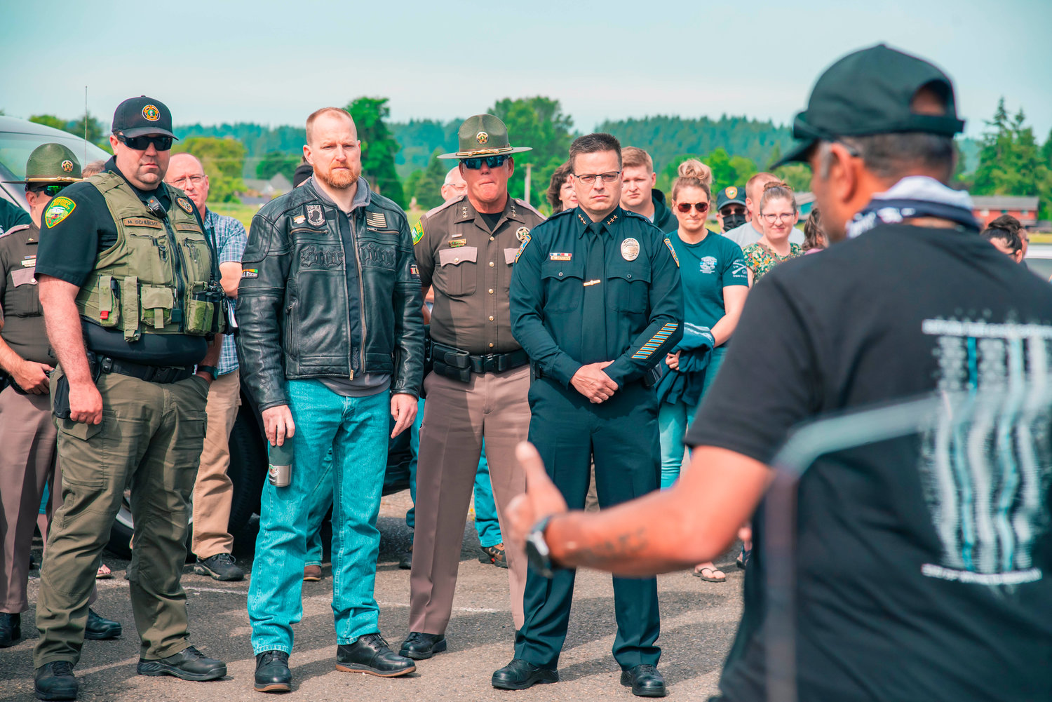 Community members gather to honor trooper Justin R. Schaffer during the Beyond the Call of Duty Ride to Remember 2020 memorial ride to the Chehalis Washington State Patrol office in his honor on Sunday.