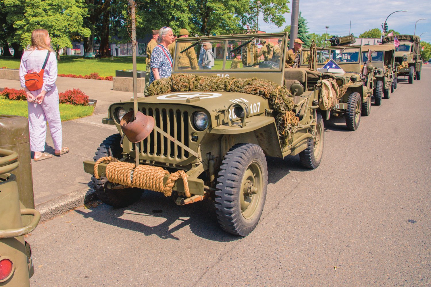 Military vehicles are seen parked in front of George Washington Park in Centralia Monday morning.
