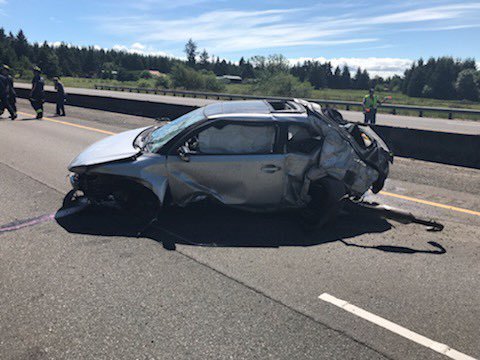 Northbound and southbound Interstate 5 are open again at mile marker 66 after a serious crash. Trooper Will Finn says a driver was airlifted to Harborview Medical Center. The vehicle was traveling southbound when it hit the barrier and rolled into the northbound lanes. Traffic was backed up a few miles in each direction.