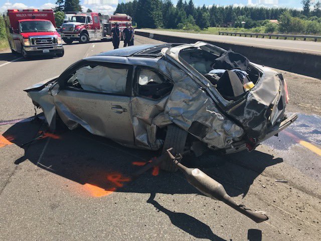 Northbound and southbound Interstate 5 are open again at mile marker 66 after a serious crash. Trooper Will Finn says a driver was airlifted to Harborview Medical Center. The vehicle was traveling southbound when it hit the barrier and rolled into the northbound lanes. Traffic was backed up a few miles in each direction.