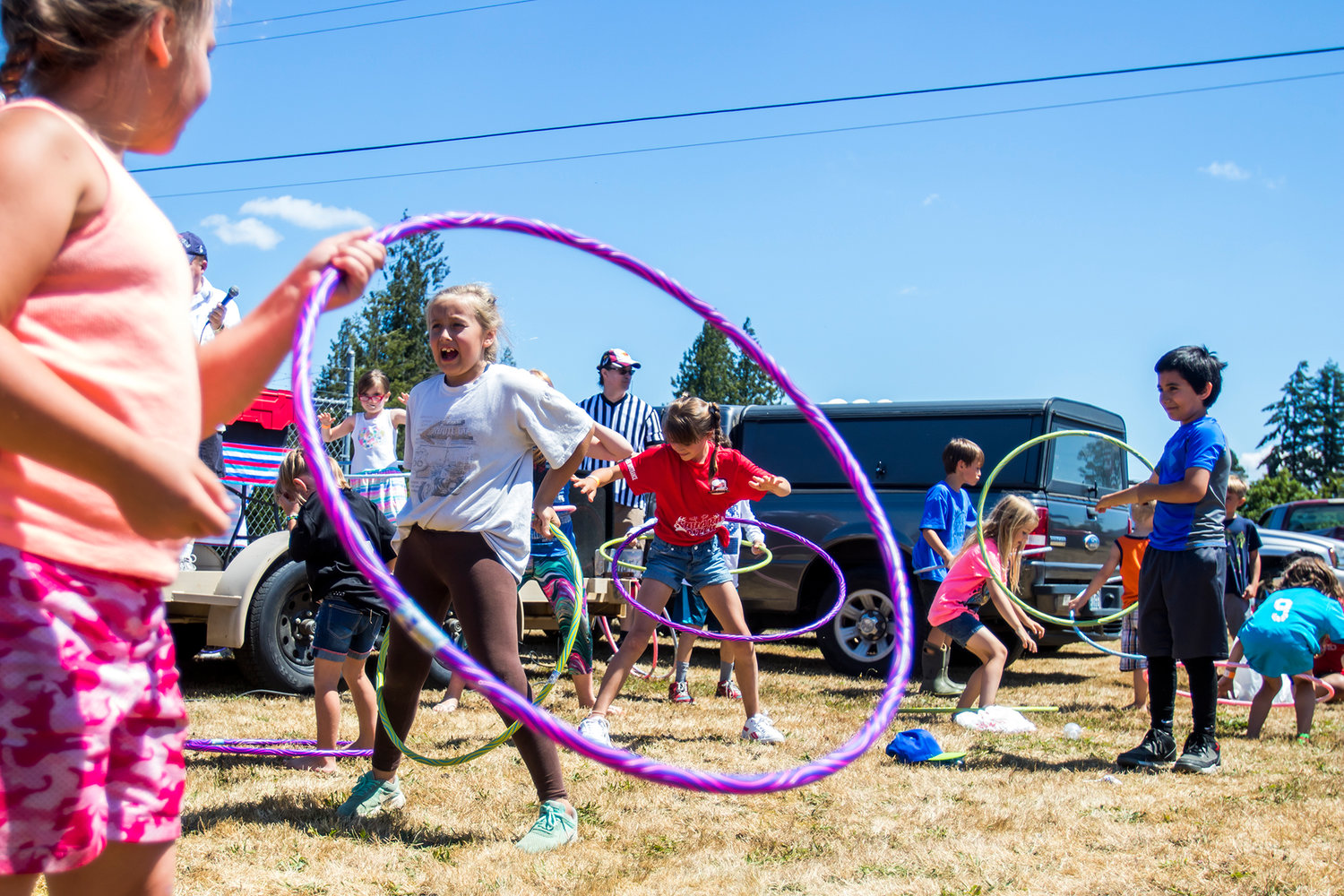 Kids play with hula-hoops during the annual Funtime Festival held in 2018.