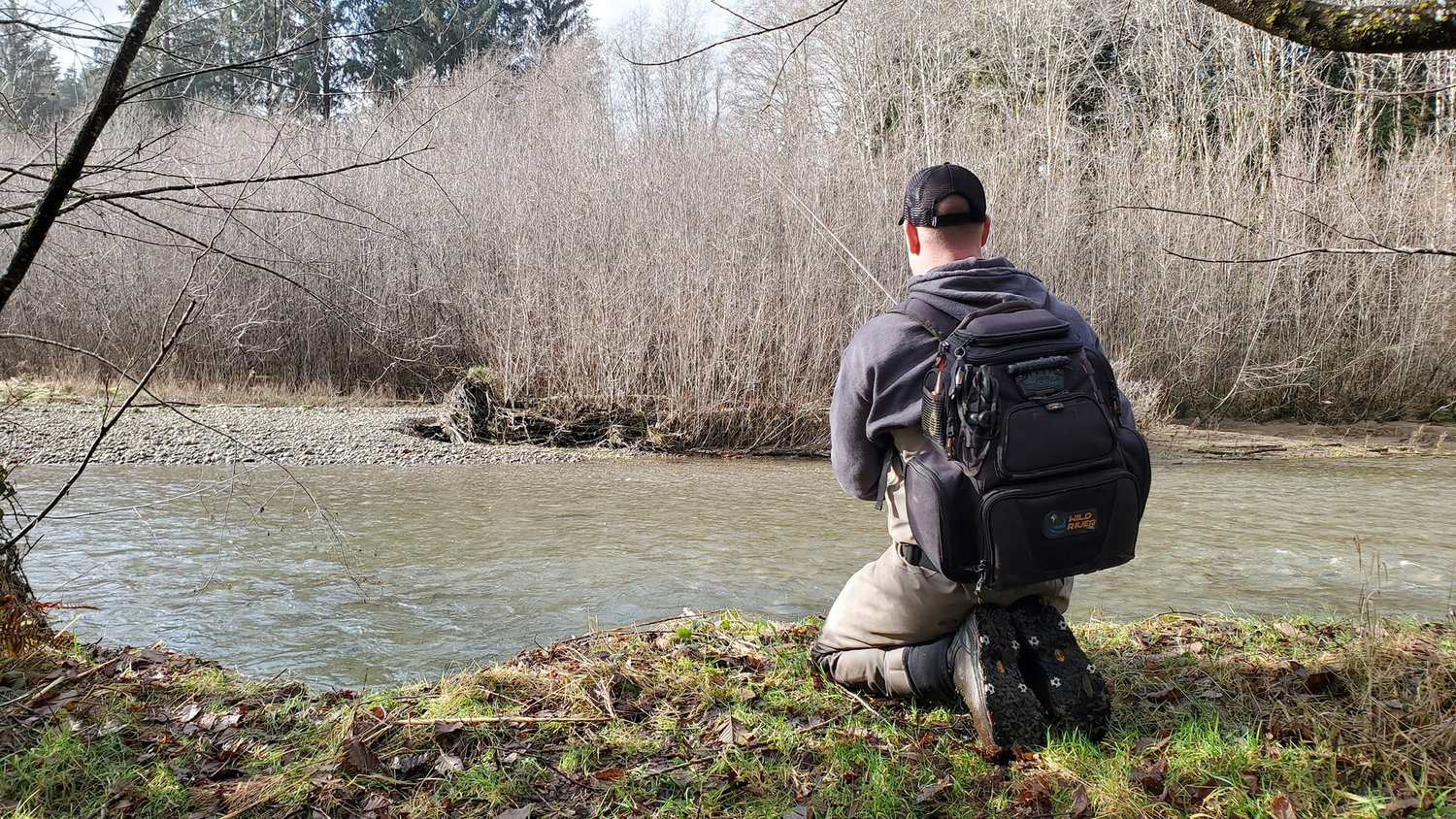 Tyson Lorton fishes for steelhead on the Queets River on the Quinault Indian Reservation on January 17, 2021.