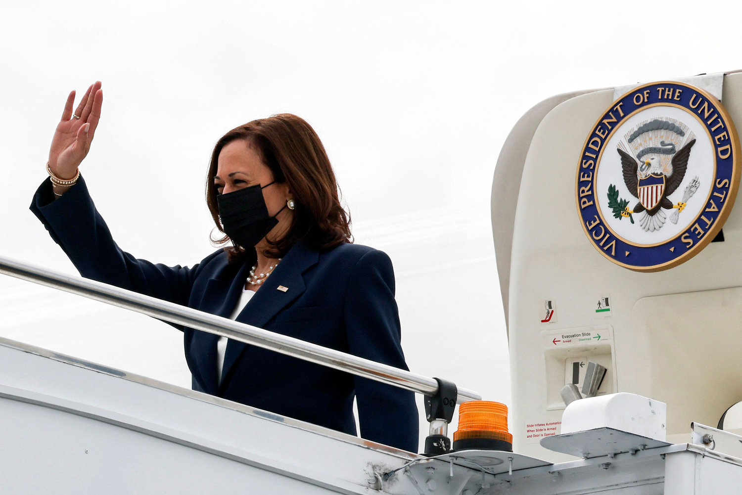 US Vice President Kamala Harris waves upon arrival at Paya Lebar Base airport in Singapore, August 22, 2021. (EVELYN HOCKSTEIN/POOL/AFP via Getty Images/TNS)