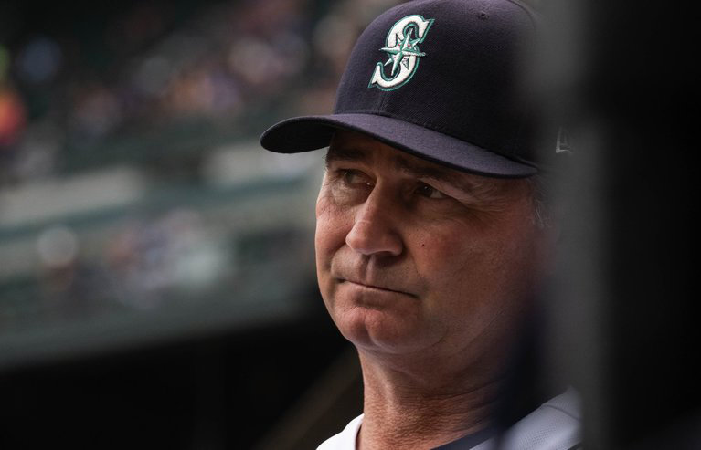 Mariners manager Scott Servais watches his team from the dugout against the Detroit Tigers in 2019.