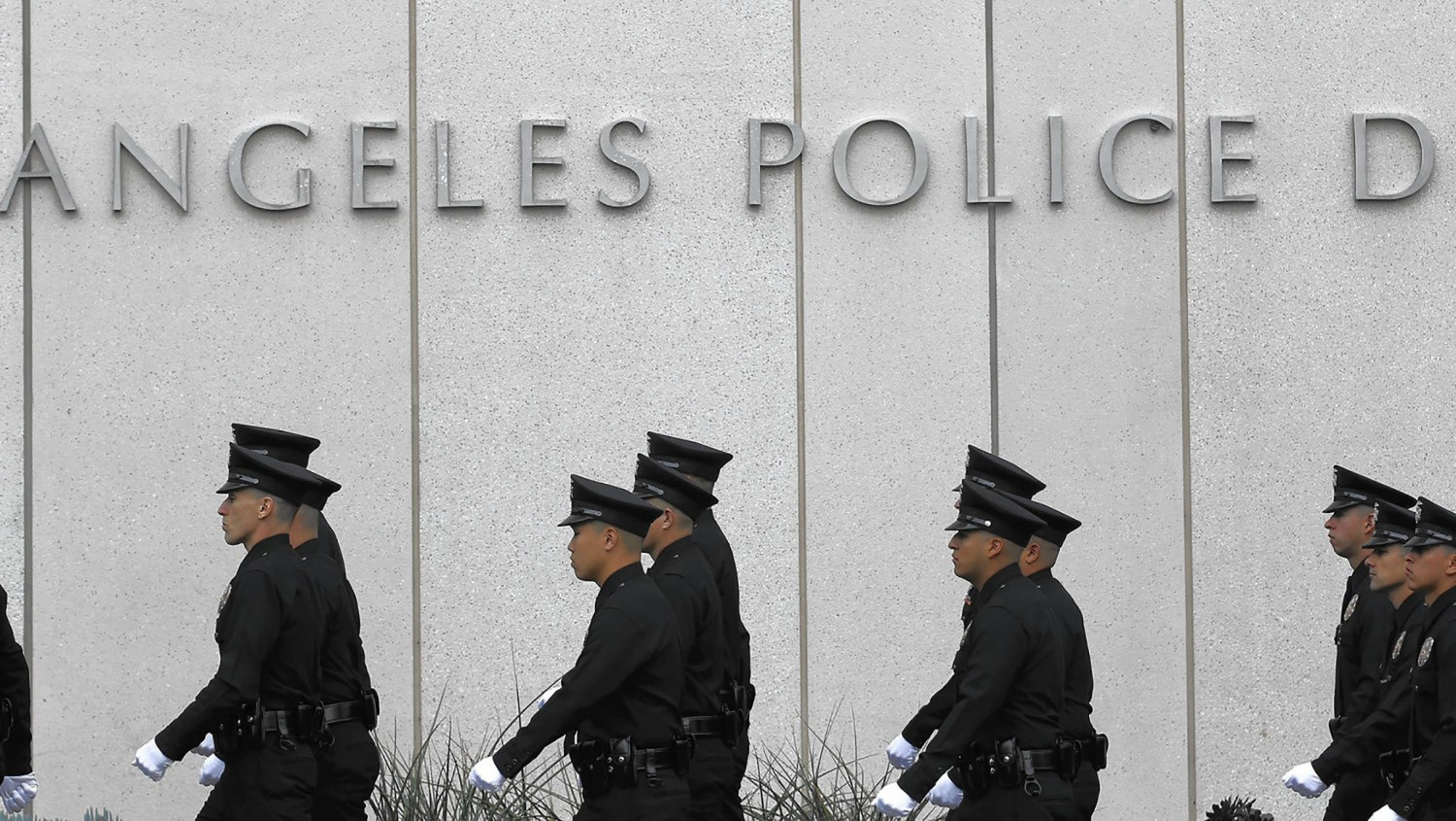 Newly sworn Los Angeles Police officers march in formation outside LAPD headquarters in downtown Los Angeles in 2015. (Brian van der Brug/Los Angeles Times/TNS)